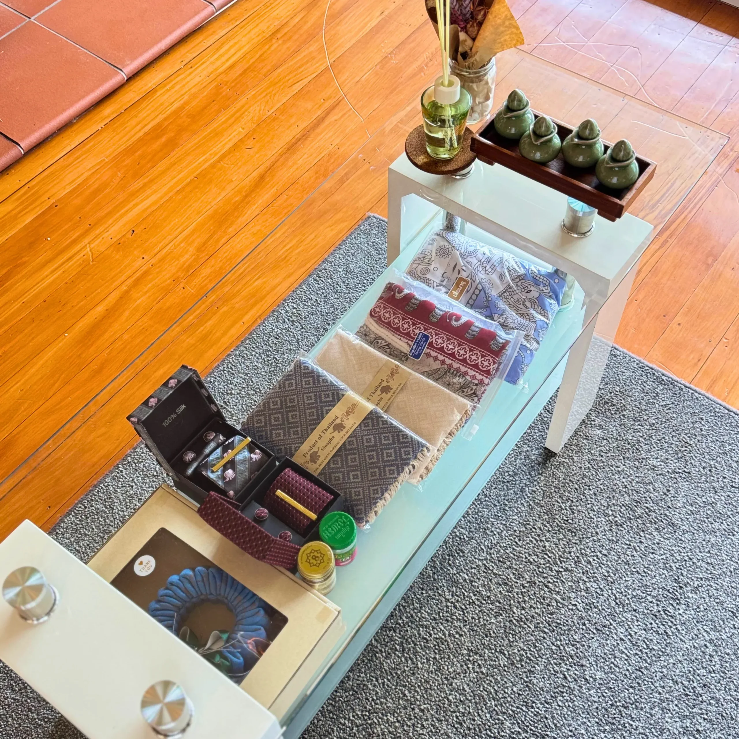 A photo of the waiting area table with products