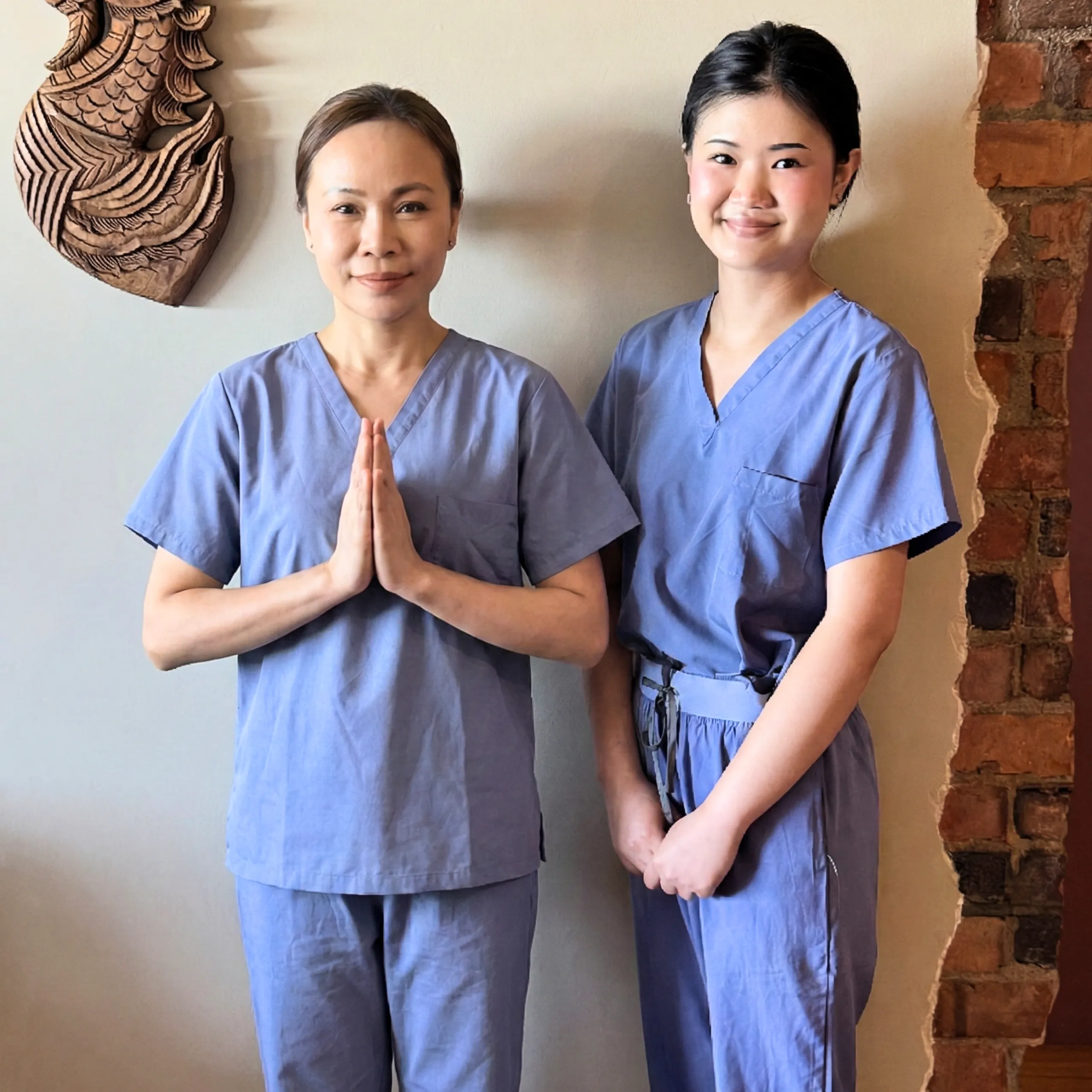 kitty and vasi photo full body smiling and vasi is sawasdee kap traditional greeting