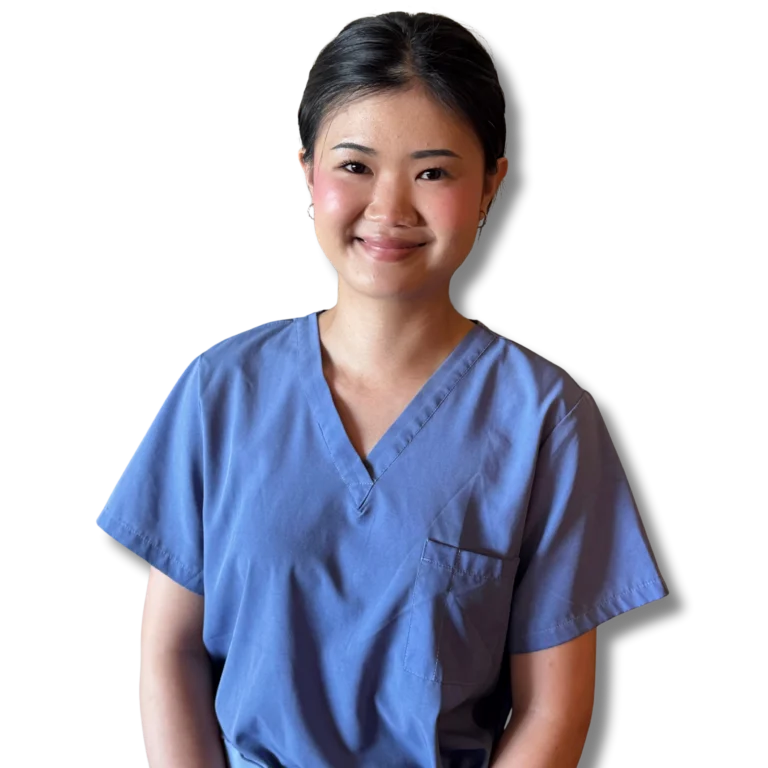 photograph of thai massage therapist kitty smiling half body shot