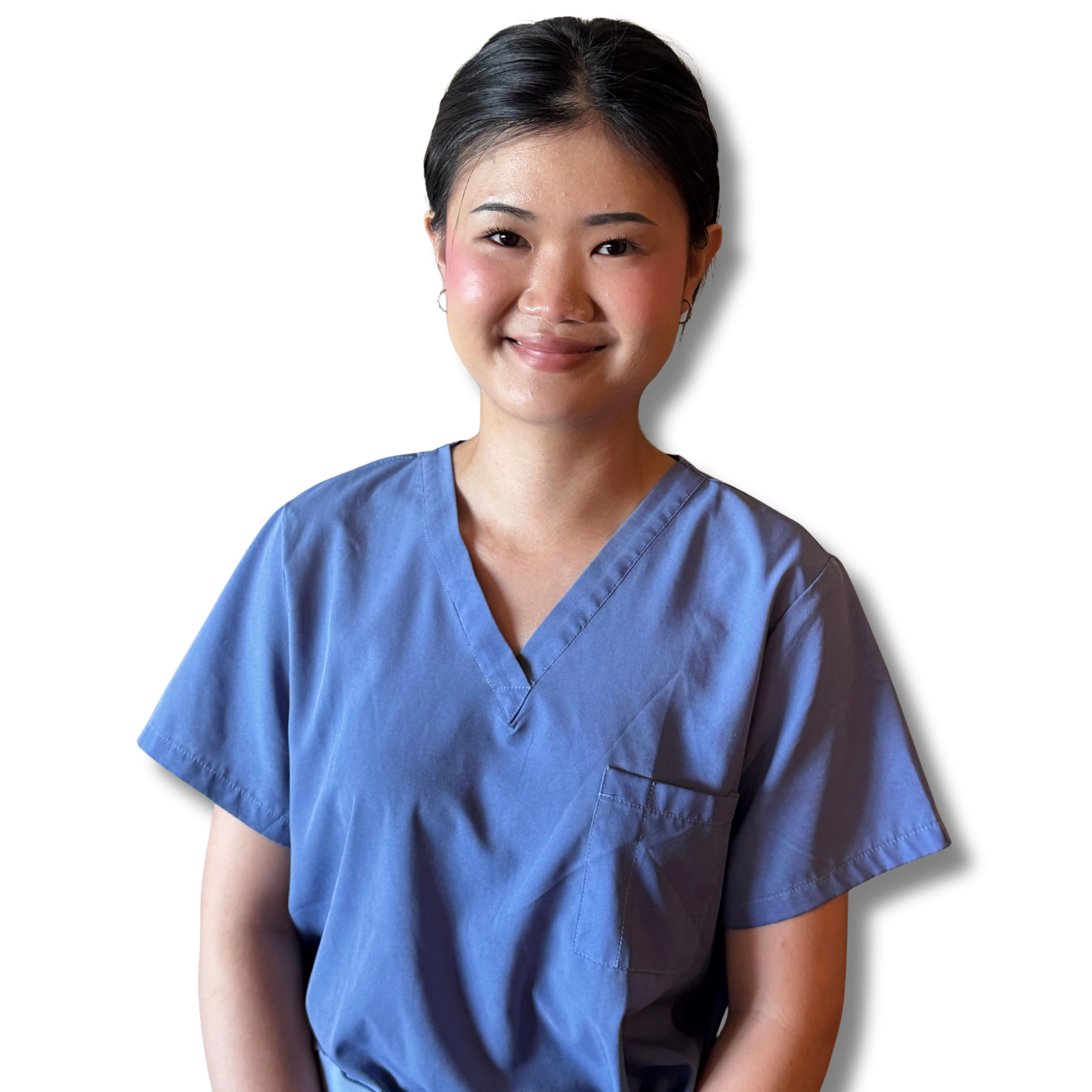 photograph of thai massage therapist kitty smiling half body shot